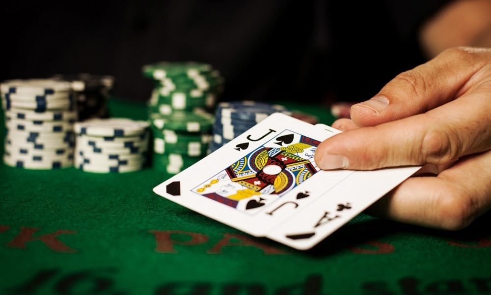 The Influence of Side Bets in Blackjack Strategy